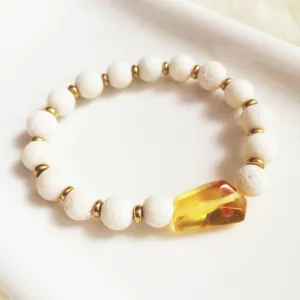 Amber, white coral & brass bracelet